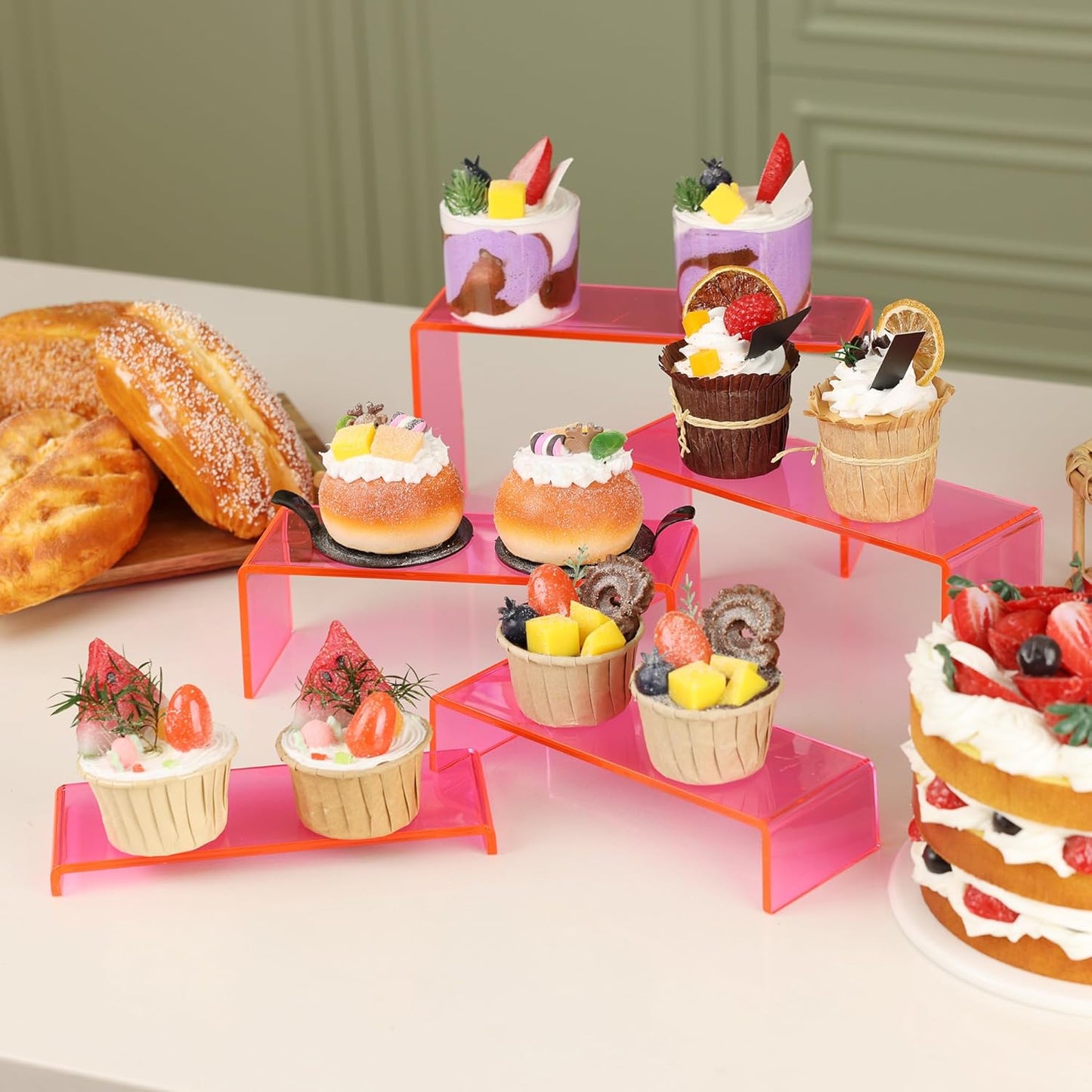 Goabroa Acrylic Display Risers, 2 Sets 10 Pcs Perfume Stand Organizer, Rectangular Riser Shelves for Figures, Cupcake, perfume display, Wine Glass and Handbag display，Transparent Pink